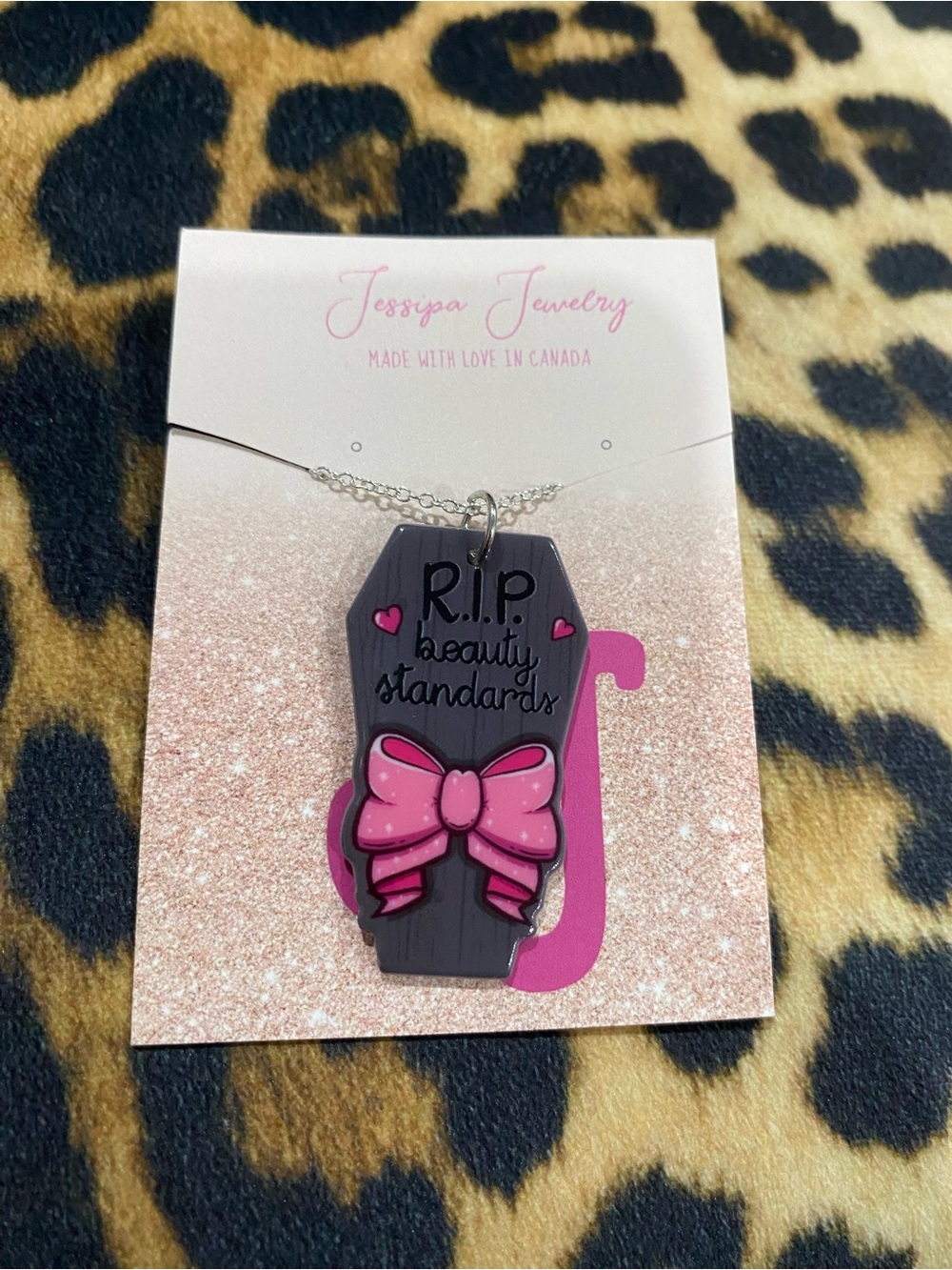 R.I.P. Beauty Standards Coffin Necklace with Pink Bow